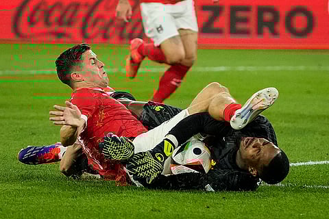 Christoph Baumgartner colides with France goalkeeper